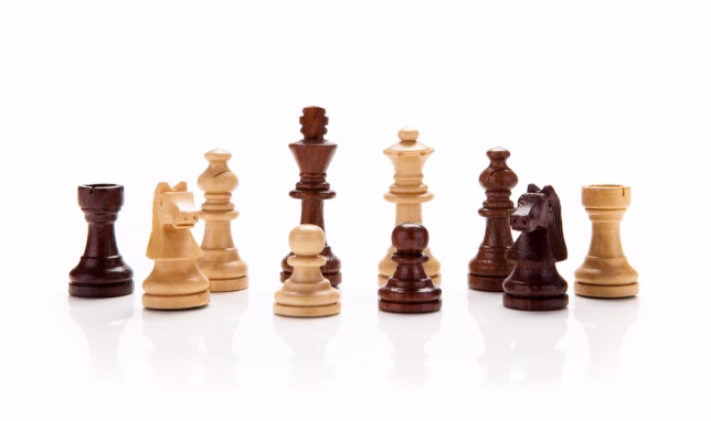 chess pieces closeup on a white background